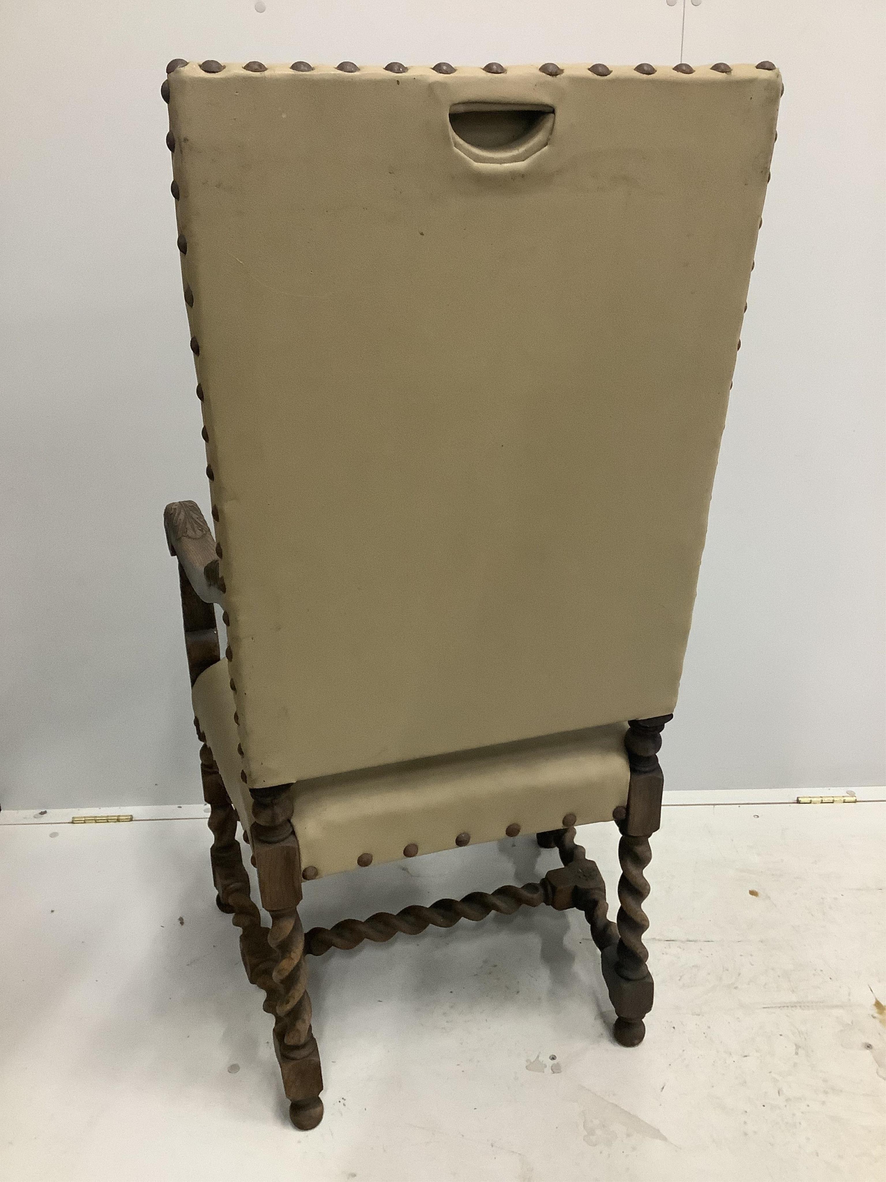 Six Carolean style carved oak dining chairs, two with arms. Condition - poor to fair